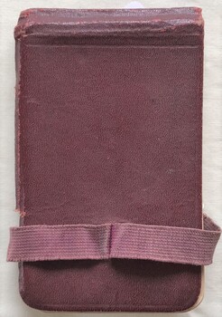 Diary with fold-over cover and loose elastic band