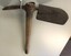 Combination of spade and pick with wooden handle
