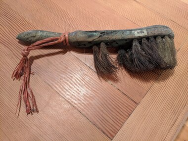 Wooden handled brush, hand crafted from sundry miscellaneous wooden parts.