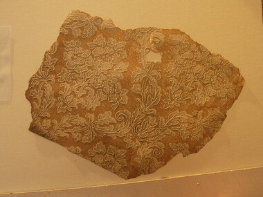 Embossed floral wallpaper fragment 