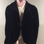 Black velvet jacket with diamanté clasp