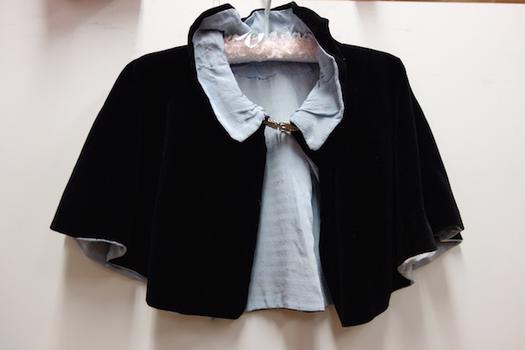 Black velvet evening cape with blue silk lining