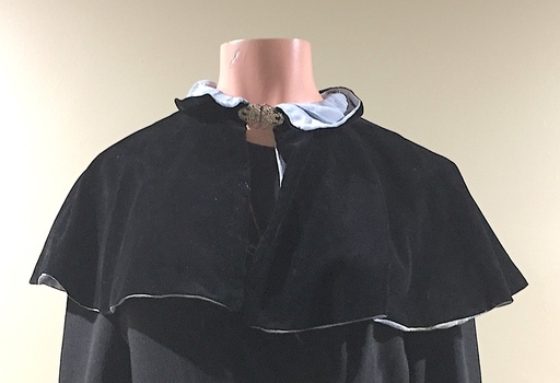 Black velvet evening cape with blue silk lining