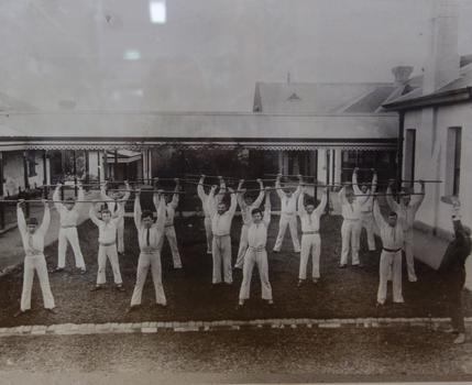 Boys Exercising, Kew Cottages, circa 1900