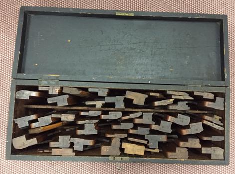 Blackened Wood Toolbox with Hinged Lid containing 45 Moulding Planes