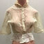Ornamental cream lace bodice