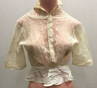 Ornamental cream lace bodice