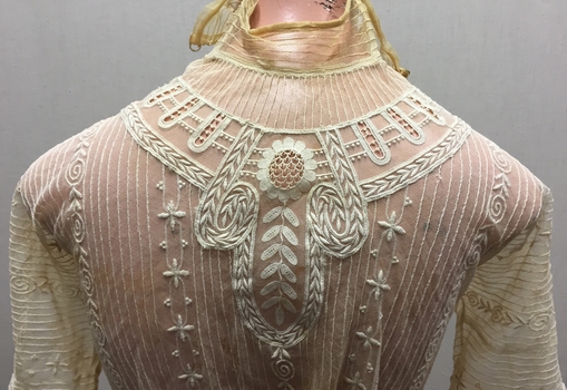 Ornamental cream lace bodice