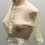Ornamental cream lace bodice