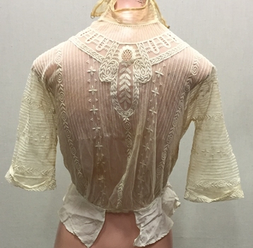 Ornamental cream lace bodice