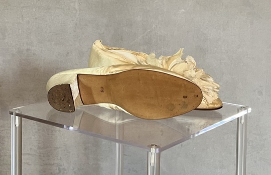 Pair of leather soled silk wedding shoes