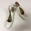 Pair of Women's White Leather Slingback Shoes