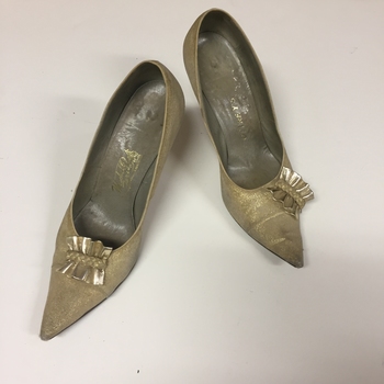 Pair of Women's Gold Leather Shoes