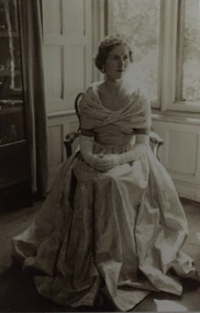 Studio portrait of ^^ wearing her dress and tiara to the Coronation of Elizabeth II