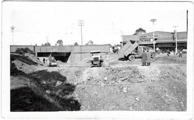 Filling in the Outer Circle Railway cutting at East Kew