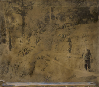 Men on the bank of the Yarra River