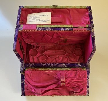 Upright, embossed celluloid, silk lined vanity dresser box