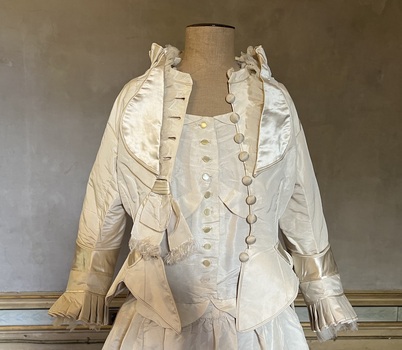 Ivory silk and satin wedding dress and jacket