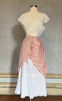 Pink lobster-tail bustle