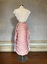 Pink lobster-tail bustle