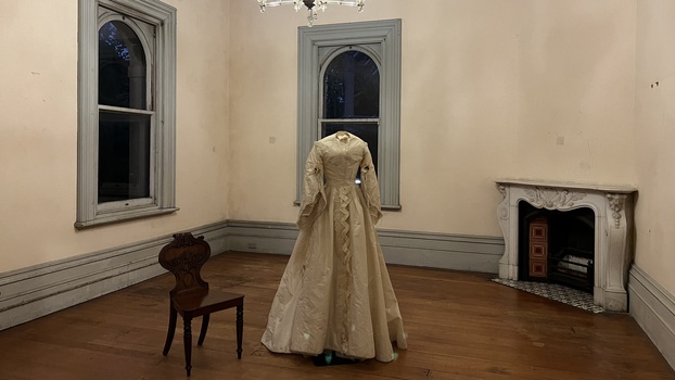 Exhibition - Fashion in the Age of Elegance 1840-1900. Wedding dress of Caroline Michel (1851-1924).  Second bedroom, Villa Alba Museum, 2023