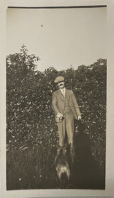 Photograph - Man and dog