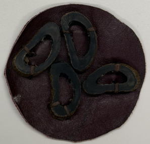 7 loops on 2 circles of leather, 1999
