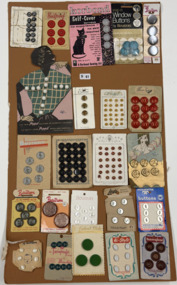 Buttons on large brown card, 1930