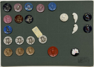 21 buttons on dark green card, c. 1950s