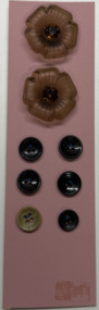8 buttons on pink card, 1940s