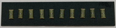10 buttons on green card, 1930s