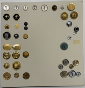 40 buttons on cream card, 1960s