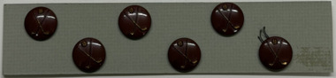 6 buttons on green card, 1930s