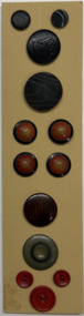 13 buttons on ochre card, 1880s - 1950s