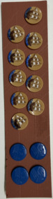 14 buttons on brown card, 1930s