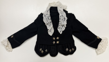 25 "Pipers" buttons on boy's Scottish jacket, 1995
