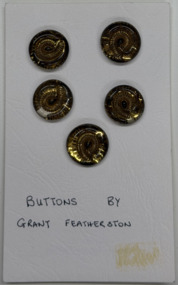 5 buttons on white card + photograph, 1954