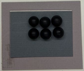 6 buttons on grey on mauve card, 1859