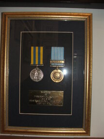 Two Round medals from the Korean war.