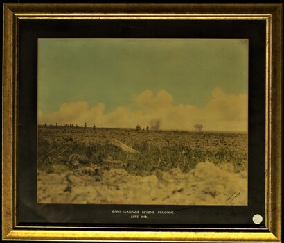 WW1 soldiers in an open battle field beyond Peronne