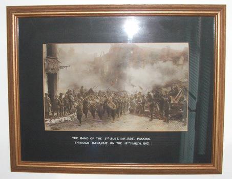 The Band of the 5th AUST. INF. BDE. passing through BAPAUME on the 19th March 1917.