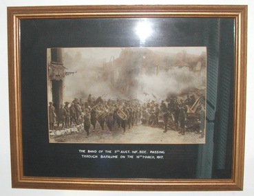 The Band of the 5th AUST. INF. BDE. passing through BAPAUME on the 19th March 1917.