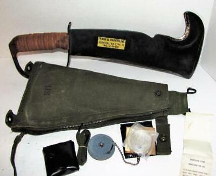 This is the original full kit, not sure if it was the standard US Military issue or just the ax and scabbard?