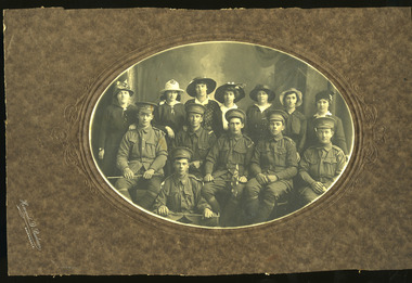 group soldiers posing with women