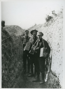 soldiers posing in trench