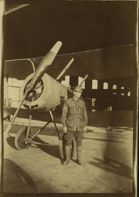 soldier infront of plane
