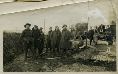 soldiers resting by road