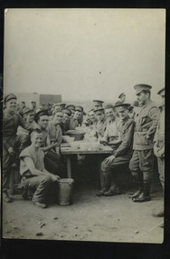 group of soldiers posing at dinner