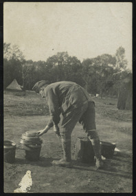 soldier working in camp