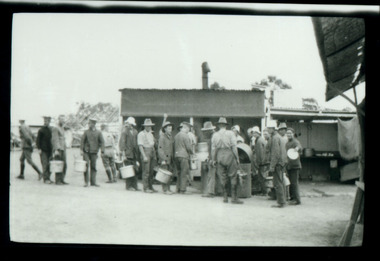 soldiers in camp queuing, les chandler_a00216.tif